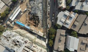 Aerial construction site overview - ALTA SURVEY North Carolina Drone aerial view of a construction site showing earthwork, grading plan details, and early site development