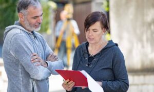 Property owner discusses the average cost for a land survey with a survey professional in Wilmington, North Carolina