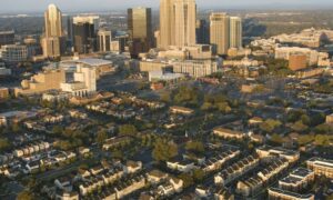 Aerial view of Charlotte, NC neighborhoods and downtown—an area where boundary surveys help clarify zoning and property lines.