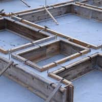 Building foundation formwork showing how stormwater design must be coordinated early with structural construction