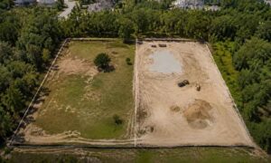Aerial view of adjacent lots being combined for construction planning by a land survey company in wilmington and charlotte north carolina