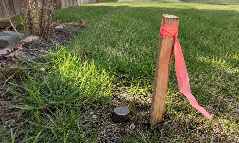 Property line marker charlotte nc - ALTA SURVEY North Carolina Metal property line marker beside a temporary survey stake in a Charlotte, North Carolina yard
