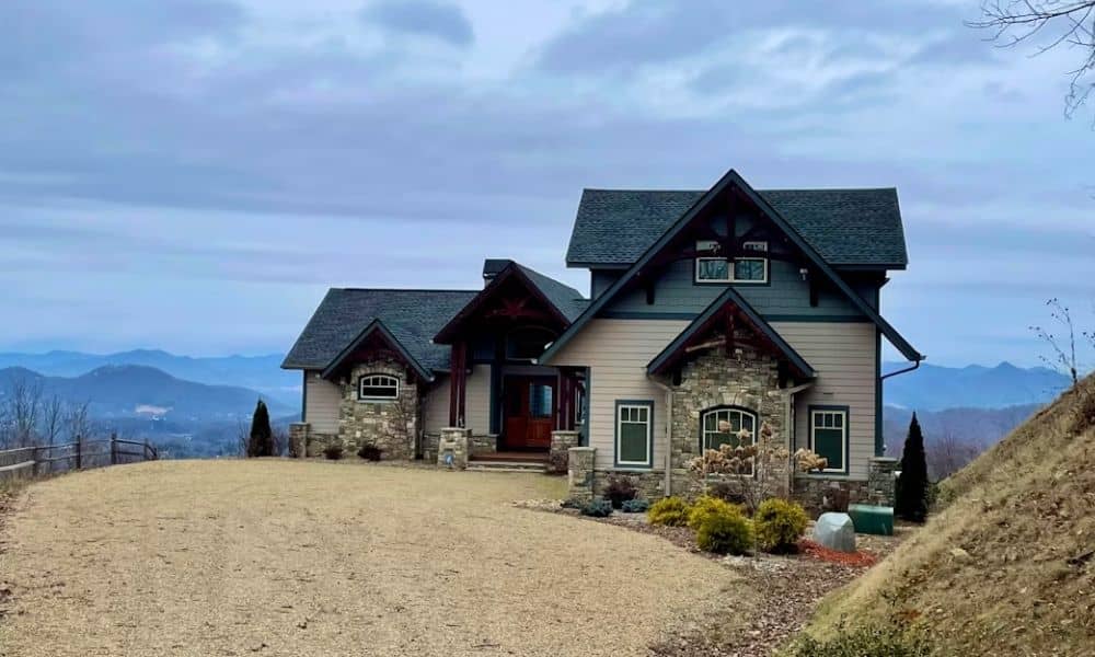 Hillside home with mountain views, illustrating terrain considered in a boundary line survey for retaining wall placement