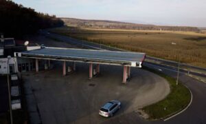 Fuel station with a large canopy and road access, an example of property considered in an ALTA land title survey